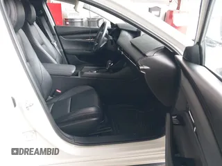 2019 Mazda 3 w/Select with VIN JM1BPACL2K1106916, listed as a IAAI auction lot 42082381 with 63,017 mi miles. Bid and sale history available at carsss.com. Image 5.