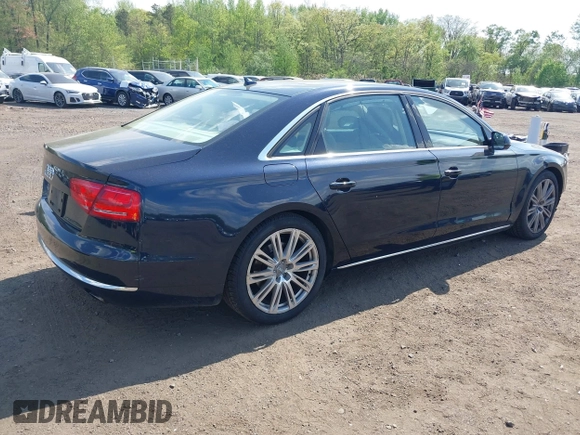 2014 Audi A8 3.0T z VIN WAURGAFD7EN005979, wystawiony jako IAAI lot #42169900 z przebiegiem 126 523 mil mil oraz . Historia ofert i sprzedaży dostępna na DreamBid. Obrazek 4.