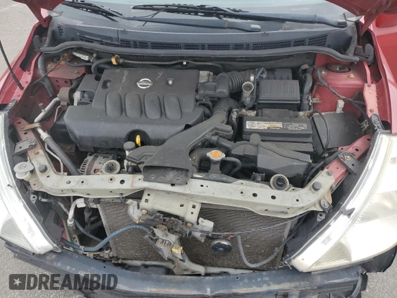 2010 Nissan Versa 1.8 S with VIN 3N1BC1AP4AL371722, listed as a Copart auction lot 72641144 with 128,445 mi miles and Salvage Title. Bid and sale history available at carsss.com. Image 12.