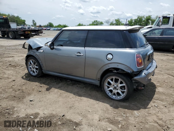 2007 MINI Hardtop S with VIN WMWMF73577TT84087, listed as a Copart auction lot 60208895 with 76,248 mi miles and Salvage title. Bid and sale history available at DreamBid. Image 2.