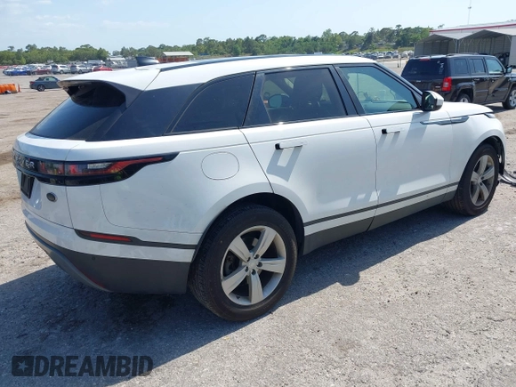 2020 Land Rover Range Rover Velar S z VIN SALYB2EX7LA252141, wystawiony jako IAAI lot #42131779 z przebiegiem 101 612 mil mil oraz . Historia ofert i sprzedaży dostępna na DreamBid. Obrazek 4.