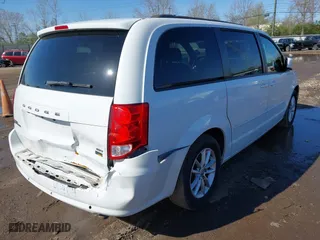 2016 Dodge Grand Caravan SXT with VIN 2C4RDGCG2GR390001, listed as a IAAI auction lot 41943622 with 127,328 mi miles. Bid and sale history available at carsss.com. Image 4.