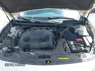 2016 Nissan Maxima SV z VIN 1N4AA6AP5GC406841, wystawiony jako IAAI lot #41829964 z przebiegiem 149 297 mil mil oraz . Historia ofert i sprzedaży dostępna na DreamBid. Obrazek 10.