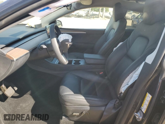 2024 Tesla Model Y with VIN 7SAYGDED0RF125308, listed as a Copart auction lot 61614675 with 11,608 mi miles and Salvage title. Bid and sale history available at DreamBid. Image 7.
