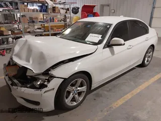 2014 BMW 3 Series 320i with VIN WBA3B1G57ENS79355, listed as a IAAI auction lot 41620998 with 97,362 mi miles. Bid and sale history available at carsss.com. Image 2.