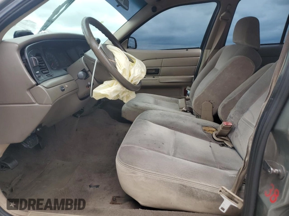 2003 Ford Police Interceptor Street Appear with VIN 2FAFP71W83X132646, listed as a Copart auction lot 55864205 with 211,073 mi miles and Salvage title. Bid and sale history available at DreamBid. Image 7.
