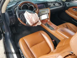 2002 Lexus SC 430 with VIN JTHFN48Y320020970, listed as a Copart auction lot 59332975 with 148,346 mi miles and Salvage title. Bid and sale history available at DreamBid. Image 8.