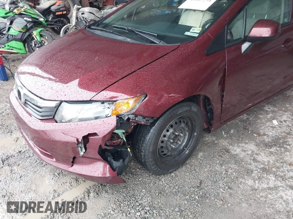 2012 Honda Civic LX z VIN 2HGFB2F57CH575278, wystawiony jako IAAI lot #42012251 z przebiegiem 258 807 mil mil oraz . Historia ofert i sprzedaży dostępna na DreamBid. Obrazek 6.
