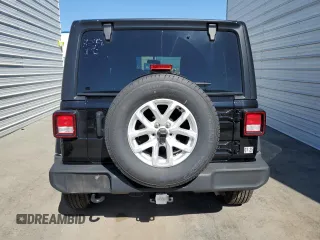 2023 Jeep Wrangler Sport with VIN 1C4HJXDNXPW701795, listed as a Copart auction lot 50451444 with 7,274 mi miles and Salvage Title. Bid and sale history available at DreamBid. Image 6.