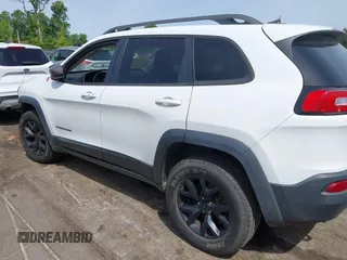 2016 Jeep Cherokee Trailhawk z VIN 1C4PJMBS7GW109189, wystawiony jako IAAI lot #42219470 z przebiegiem 115 197 mil mil oraz . Historia ofert i sprzedaży dostępna na DreamBid. Obrazek 3.