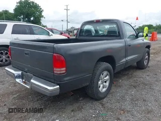 2003 Dodge Dakota with VIN 1D7FL46X43S190137, listed as a IAAI auction lot 42525471 with 130,773 mi miles and . Bid and sale history available at DreamBid. Image 4.