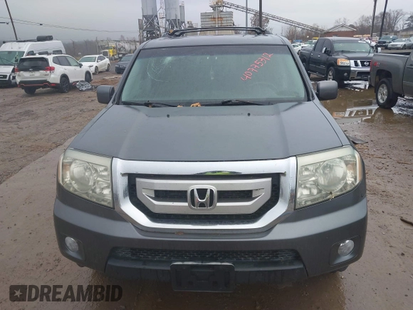 2011 Honda Pilot EX-L with VIN 5FNYF4H60BB034218, listed as a IAAI auction lot 40775312 with 168,549 mi miles and . Bid and sale history available at carsss.com. Image 12.