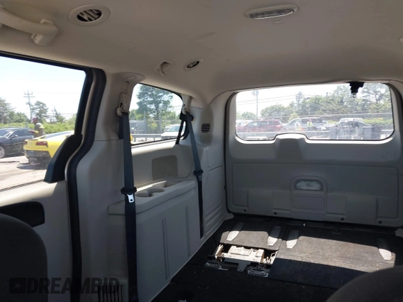 2015 Dodge Grand Caravan American Value with VIN 2C4RDGBG3FR647957, listed as a IAAI auction lot 42147813 with 129,859 mi miles and . Bid and sale history available at DreamBid. Image 8.