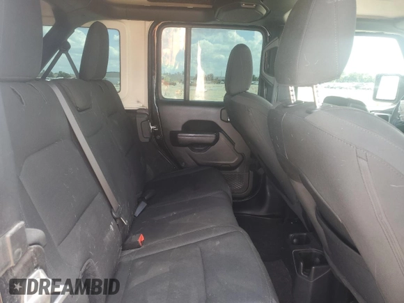 2021 Jeep Wrangler Unlimited Willys with VIN 1C4HJXDN0MW859686, listed as a Copart auction lot 56657725 with 49,984 mi miles and Salvage title. Bid and sale history available at DreamBid. Image 11.