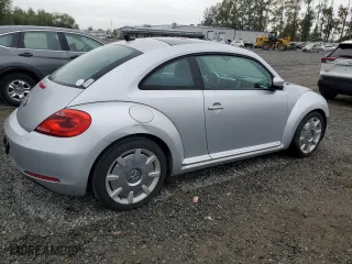 2012 Volkswagen Beetle 2.5L w/Sun PZEV with VIN 3VWJP7AT6CM630282, listed as a Copart auction lot 71096824 with 85,312 mi miles and Clean Title. Bid and sale history available at carsss.com. Image 3.