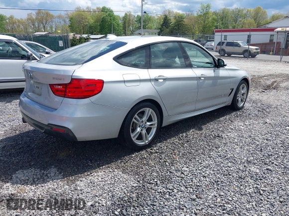 2014 BMW 3 Series 328i Gran Turismo xDrive z VIN WBA3X5C51ED556554, wystawiony jako IAAI lot #42149391 z przebiegiem 189 624 mil mil oraz . Historia ofert i sprzedaży dostępna na DreamBid. Obrazek 4.