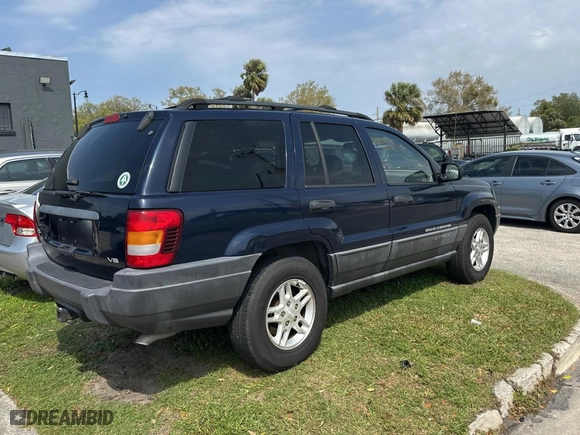 2004 Jeep Grand Cherokee Laredo with VIN 1J4GX48N24C436753, listed as a Copart auction lot 48782585 with 114,035 mi miles and Clean Title. Bid and sale history available at carsss.com. Image 4.