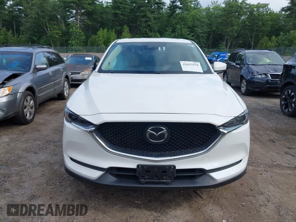 2018 Mazda CX-5 Grand Touring with VIN JM3KFBDM0J0308813, listed as a IAAI auction lot 42657978 with 78,119 mi miles and . Bid and sale history available at DreamBid. Image 13.