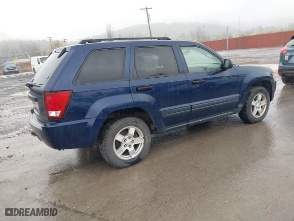 2006 Jeep Grand Cherokee Laredo with VIN 1J4GR48KX6C135070, listed as a IAAI auction lot 41966282 with 142,833 mi miles. Bid and sale history available at carsss.com. Image 4.