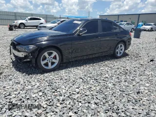 2012 BMW 3 Series 328i with VIN WBA3A5G55CNN65681, listed as a Copart auction lot 61018025 with 156,903 mi miles and Salvage title. Bid and sale history available at DreamBid. Image 1.