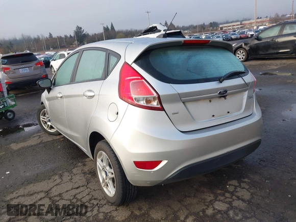 2019 Ford Fiesta SE z VIN 3FADP4EJ7KM147864, wystawiony jako IAAI lot #41692160 z przebiegiem 87 417 mil mil oraz . Historia ofert i sprzedaży dostępna na DreamBid. Obrazek 3.