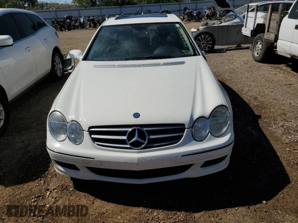 2009 Mercedes-Benz CLK-Class 3.5L with VIN WDBTJ56H09F261819, listed as a Copart auction lot 70021184 with 130,976 mi miles and Salvage Title. Bid and sale history available at carsss.com. Image 5.