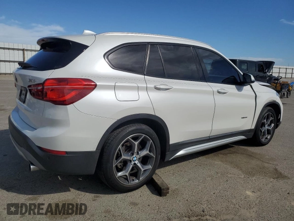 2016 BMW X1 xDrive28i z VIN WBXHT3C31GP880552, wystawiony jako Copart lot #52931305 z przebiegiem 127 225 mil mil oraz Szkoda całkowita • Salvage title. Historia ofert i sprzedaży dostępna na DreamBid. Obrazek 3.