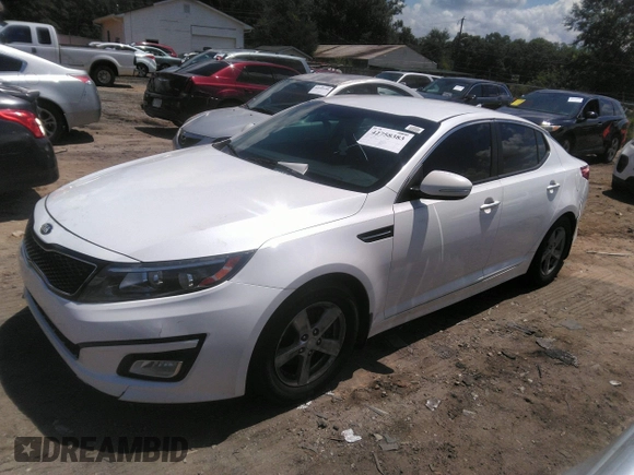 2015 Kia Optima LX with VIN KNAGM4A70F5645049, listed as a IAAI auction lot 42758383 with 214,934 mi miles and . Bid and sale history available at DreamBid. Image 2.