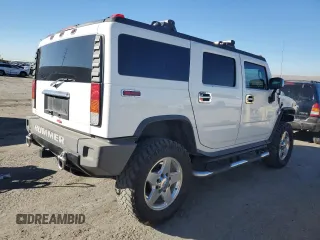 2004 Hummer H2 with VIN 5GRGN23U64H121213, listed as a Copart auction lot 42001135 with 0 mi miles and Salvage Title. Bid and sale history available at carsss.com. Image 3.