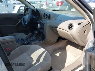 2000 Pontiac Grand Am SE1 with VIN 1G2NF52E6YM863484, listed as a IAAI auction lot 41548761 with 192,949 mi miles. Bid and sale history available at carsss.com. Image 5.