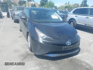 2016 Toyota Prius Two z VIN JTDKBRFUXG3003787, wystawiony jako IAAI lot #42020633 z przebiegiem 250 787 mil mil oraz . Historia ofert i sprzedaży dostępna na DreamBid. Obrazek 1.
