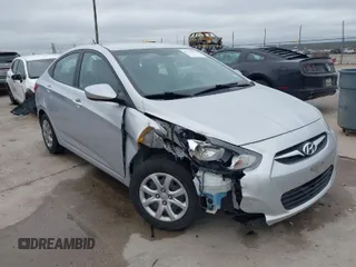 2014 Hyundai Accent GLS with VIN KMHCT4AE9EU608617, listed as a IAAI auction lot 41537589 with 77,678 mi miles. Bid and sale history available at carsss.com. Image 1.