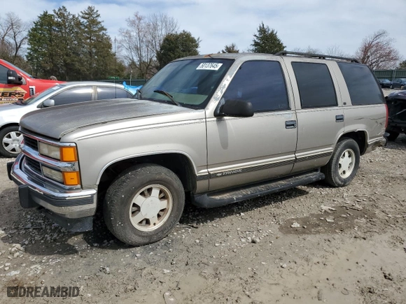 1999 Chevrolet Tahoe with VIN 1GNEC13RXXJ481481, listed as a Copart auction lot 50137645 with 233,418 mi miles and Salvage Title. Bid and sale history available at carsss.com. Image 1.