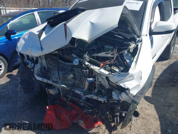 2018 Toyota Tacoma SR with VIN 5TFCZ5AN6JX144056, listed as a IAAI auction lot 41623760 with Not Provided miles and . Bid and sale history available at DreamBid. Image 6.