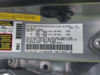 2019 Toyota Tacoma SR z VIN 3TMCZ5AN8KM211246, wystawiony jako IAAI lot #41574346 z przebiegiem 66 825 mil mil oraz . Historia ofert i sprzedaży dostępna na DreamBid. Obrazek 9.