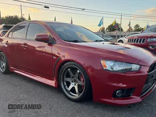 2015 Mitsubishi Lancer Evolution GSR with VIN JA32W8FV5FU026599, listed as a Copart auction lot 79051554 with 82,279 mi miles and Clean Title. Bid and sale history available at carsss.com. Image 1.