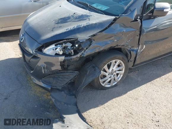 2013 Mazda 5 Sport with VIN JM1CW2BL4D0145725, listed as a IAAI auction lot 42190177 with 143,209 mi miles and . Bid and sale history available at DreamBid. Image 6.