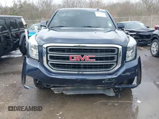 2017 GMC Yukon XL SLT with VIN 1GKS1GKC0HR319058, listed as a IAAI auction lot 41667612 with 116,695 mi miles and . Bid and sale history available at carsss.com. Image 6.