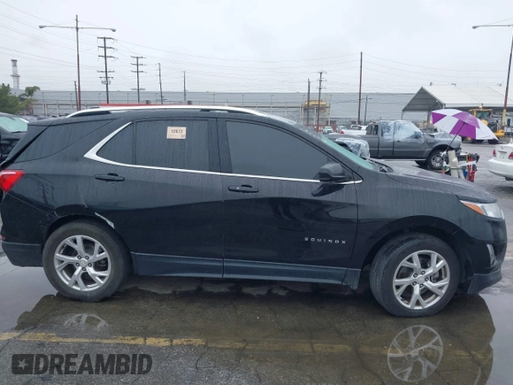 2019 Chevrolet Equinox LT with VIN 2GNAXLEX3K6186898, listed as a IAAI auction lot 41525229 with 77,673 mi miles and . Bid and sale history available at DreamBid. Image 14.