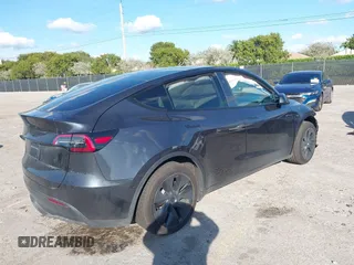 2025 Tesla Model Y Long Range with VIN 7SAYGDED4SF226776, listed as a IAAI auction lot 41514317 with 1,636 mi miles and . Bid and sale history available at DreamBid. Image 4.