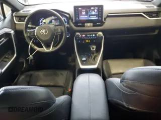 2021 Toyota RAV4 Hybrid XSE with VIN 2T3E6RFV7MW009954, listed as a Copart auction lot 54954425 with 61,397 mi miles and Salvage title. Bid and sale history available at DreamBid. Image 8.