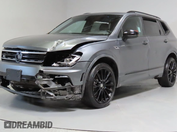 2020 Volkswagen Tiguan SE z VIN 3VV3B7AXXLM154326, wystawiony jako Copart lot #59328395 z przebiegiem 62 793 mil mil oraz Czysty tytuł • Clean title. Historia ofert i sprzedaży dostępna na DreamBid. Obrazek 2.