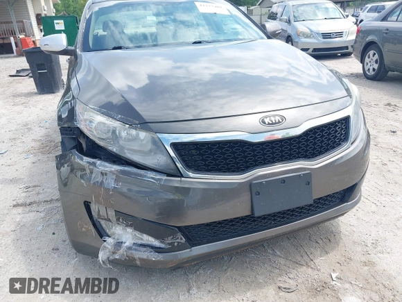 2013 Kia Optima EX z VIN 5XXGN4A77DG251606, wystawiony jako IAAI lot #42377401 z przebiegiem 135 067 mil mil oraz . Historia ofert i sprzedaży dostępna na DreamBid. Obrazek 13.