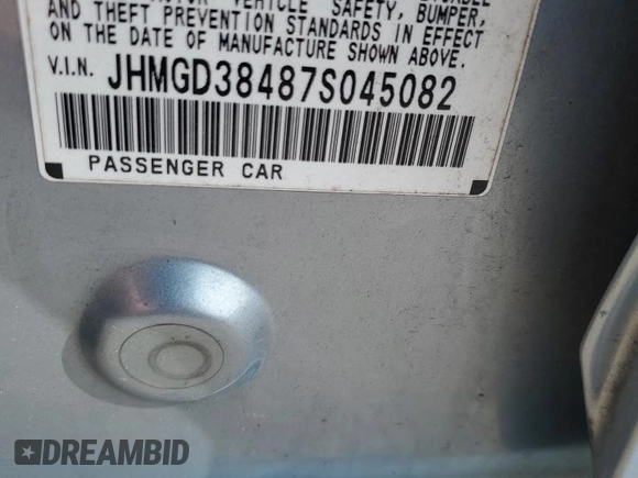 2007 Honda Fit z VIN JHMGD38487S045082, wystawiony jako Copart lot #59336665 z przebiegiem 73 754 mil mil oraz Szkoda całkowita • Salvage title. Historia ofert i sprzedaży dostępna na DreamBid. Obrazek 13.