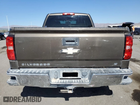 2015 Chevrolet Silverado 1500 LT with VIN 1GCRCREC2FZ388049, listed as a Copart auction lot 76098054 with 131,051 mi miles and Salvage Title. Bid and sale history available at DreamBid. Image 6.