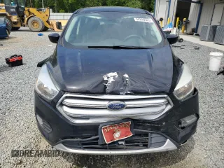 2017 Ford Escape SE z VIN 1FMCU0GD7HUA94744, wystawiony jako Copart lot #54209545 z przebiegiem 99 658 mil mil oraz Szkoda całkowita • Salvage title. Historia ofert i sprzedaży dostępna na DreamBid. Obrazek 5.
