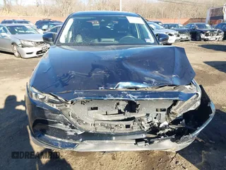 2017 Mazda CX-5 Grand Touring with VIN JM3KFBDL0H0104806, listed as a IAAI auction lot 41621964 with 60,728 mi miles. Bid and sale history available at carsss.com. Image 18.