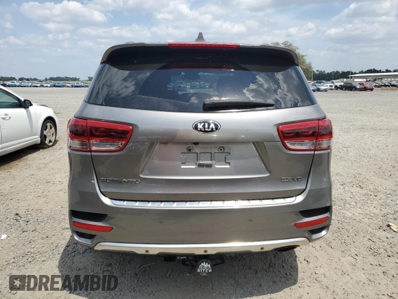 2016 Kia Sorento SX z VIN 5XYPKDA52GG141330, wystawiony jako Copart lot #55448425 z przebiegiem 78 330 mil mil oraz Szkoda całkowita • Salvage title. Historia ofert i sprzedaży dostępna na DreamBid. Obrazek 6.