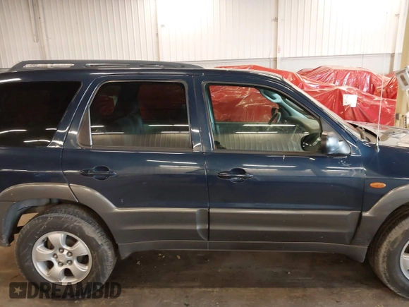 2003 Mazda Tribute LX with VIN 4F2YZ94193KM56345, listed as a IAAI auction lot 41200769 with 141,728 mi miles and . Bid and sale history available at DreamBid. Image 13.