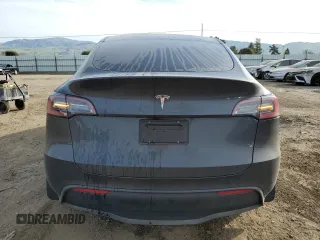 2024 Tesla Model Y with VIN 7SAYGDED5RF105278, listed as a Copart auction lot 44376125 with 12,693 mi miles and Salvage Title. Bid and sale history available at DreamBid. Image 6.